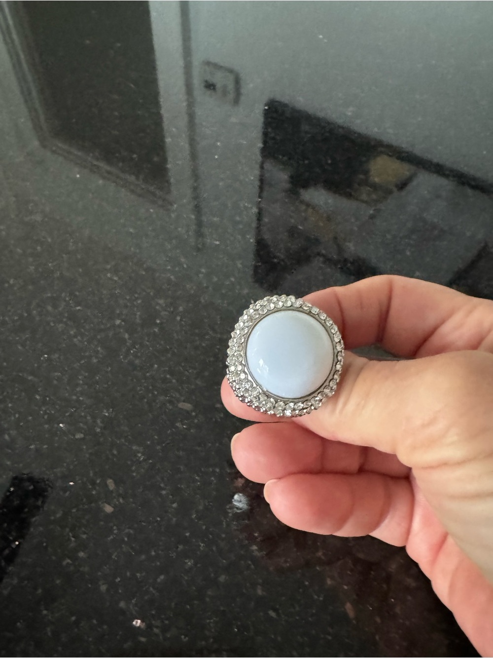 Round Silver-Tone Rhinestone Ring with Pale Blue Cabochon